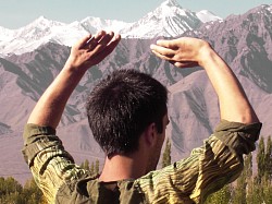 Qi Gong - standing postures, 'Holding the Sky', between Heaven and Earth, on the high Tibetan plateau beyond the Himalayan range. (Ladakh, north India) 